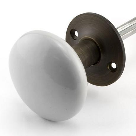 Pair of White Ceramic Doorknobs for Rim Locks - Iron Shanks - Black Powder Coat