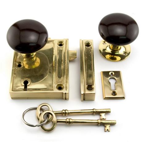 Vertical Brass Rim Lock Set with Brown Porcelain Knobs
