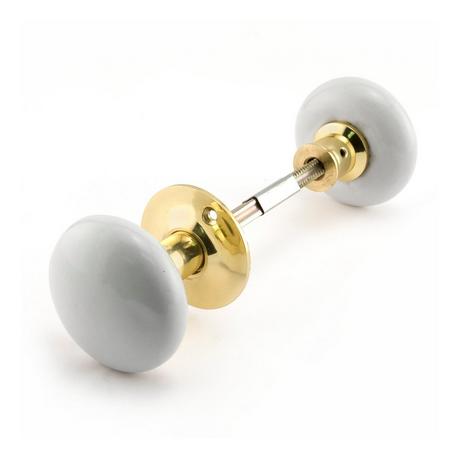 Vertical Brass Rim Lock Set with Porcelain Knobs - Right Hand - Polished Brass