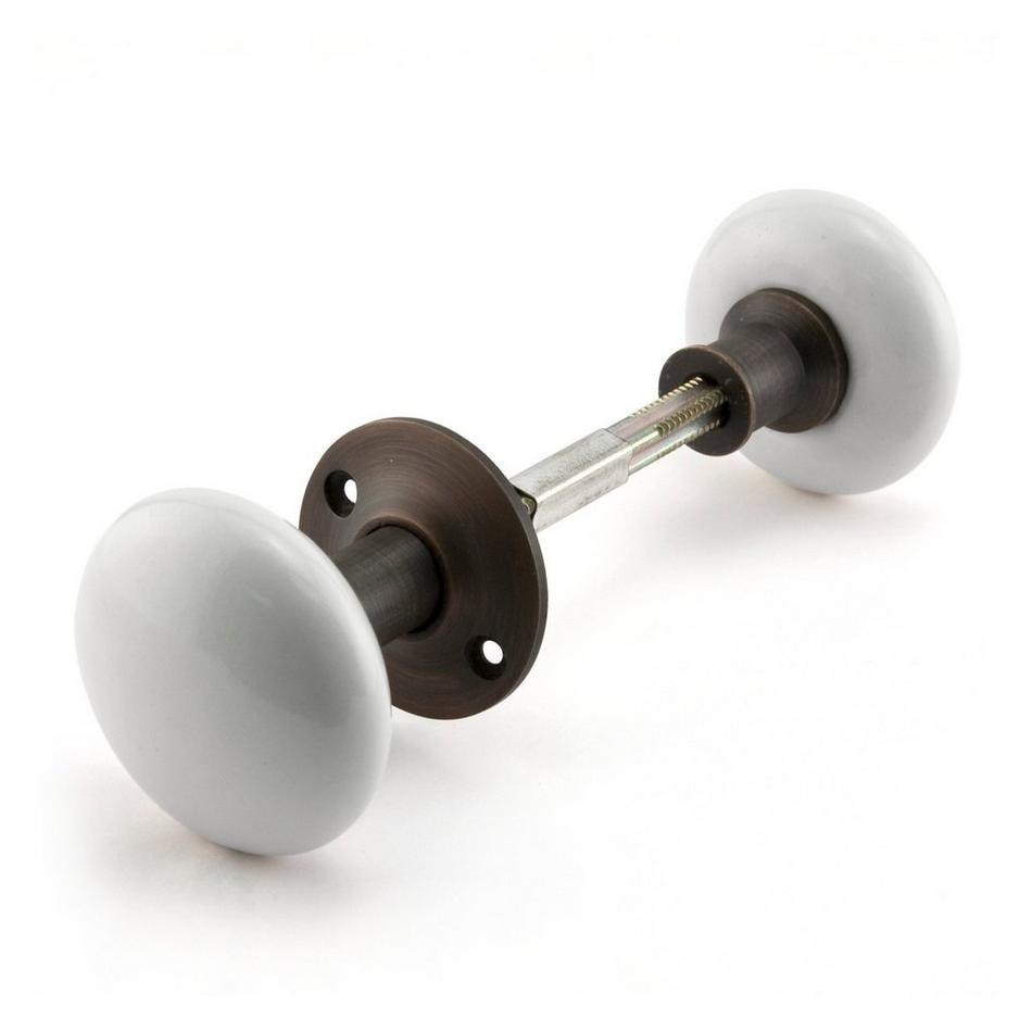 Vertical Brass Rim Lock Set with Porcelain Knobs - Oil Rubbed