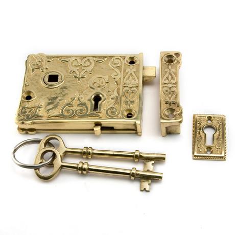 Ornate Brass Rim Lock Set with Striped Brown Porcelain Knobs - Polished Brass