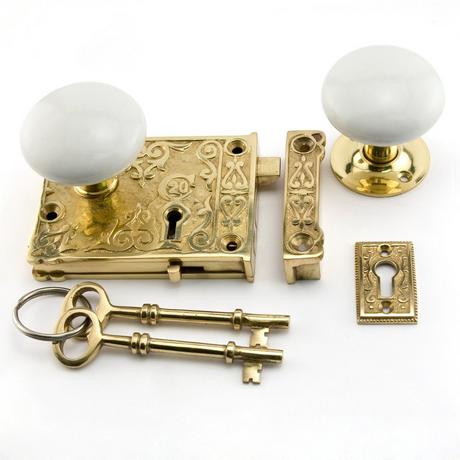 Ornate Solid Brass Rim Lock Set with Porcelain Knobs
