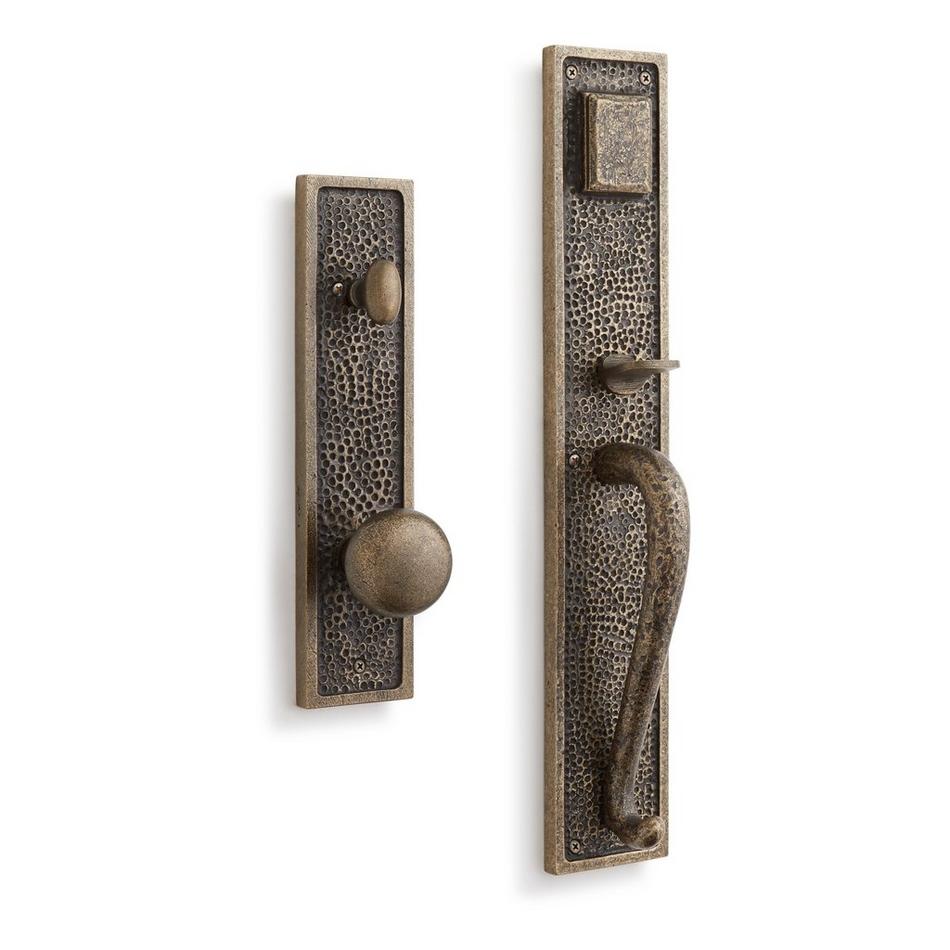 THE DOOR SIGNATURE door handle in Satin Brass and Satin Brass