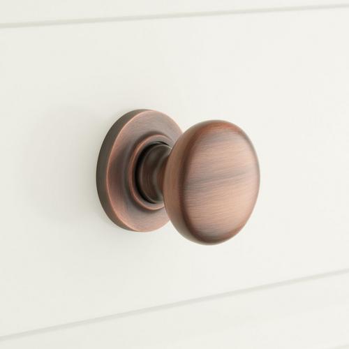 Brass Round Knob with Beveled Round Base Plate in Antique Copper