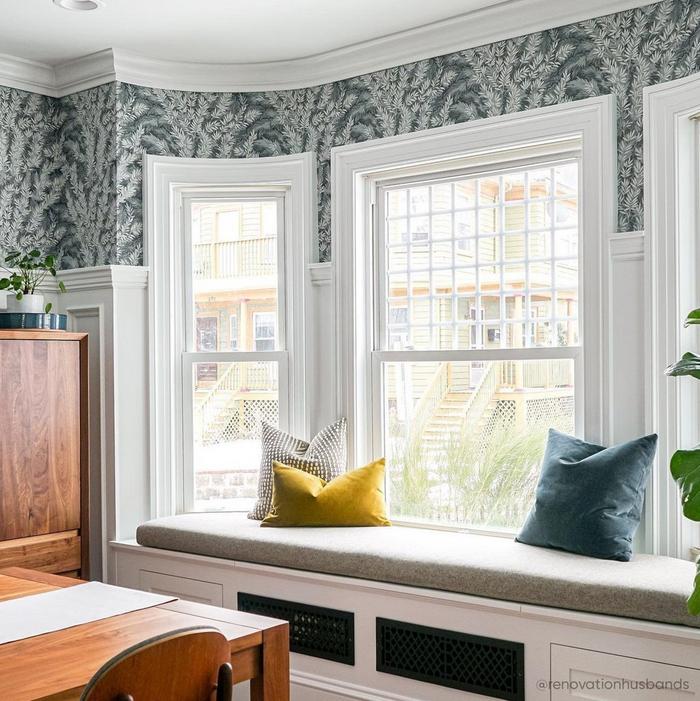 Living room from Renovation Husbands, Antique Cast Iron Wall Register located under a window bench