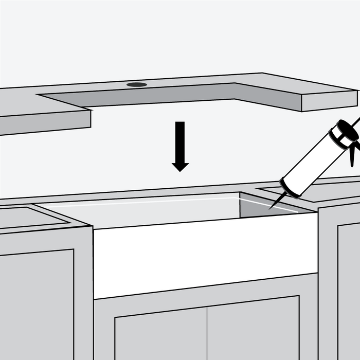 Step 4 - set the sink in place and fill in any gaps with sealant. Place countertop on top, remove excess sealant and let dry