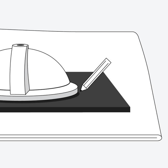 Steps to install undermount sink - a black vanity top with an undermount sink flipped over and a pencil drawing an outline