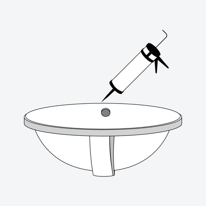 Steps to install undermount sink - silicone being applied to the rim of undermount sink