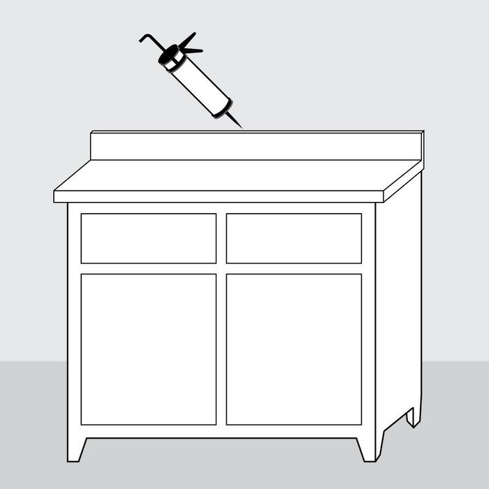 Step 7 - Attach the vanity backsplash with a bead of silicone sealant on the back and press firmly into place