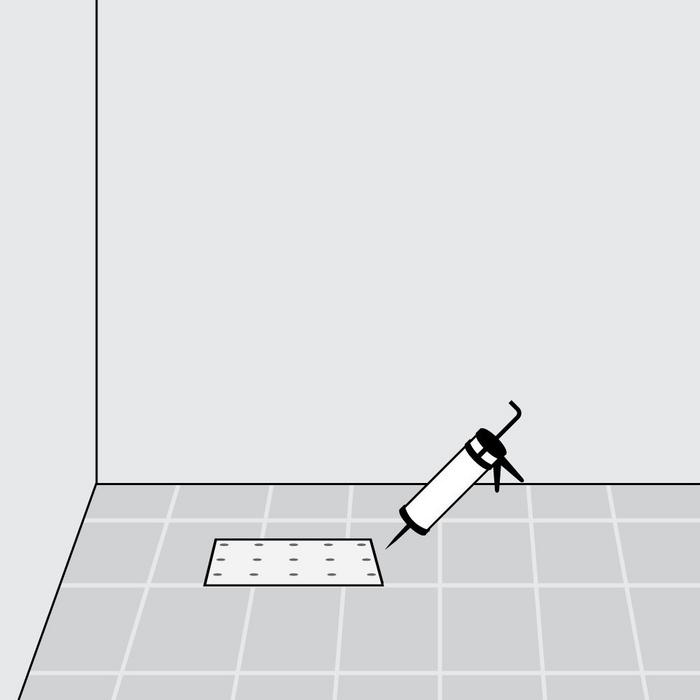 Step 5 - Apply sealant around the drain to fill in any gaps between the drain and tile