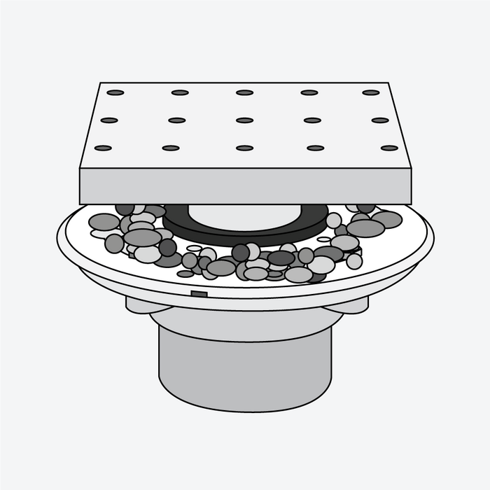 Step 2- place pea gravel over the drain flange coupling weep holes to prevent mortar from filling and blocking the holes