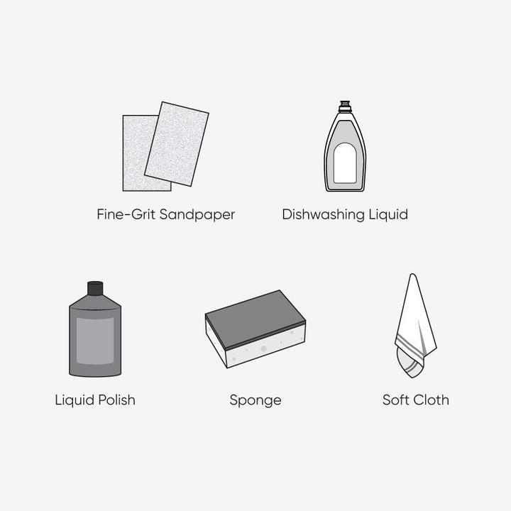 Tools and materials for acrylic tub scratch repair - fine-grit sandpaper, liquid polish, sponge