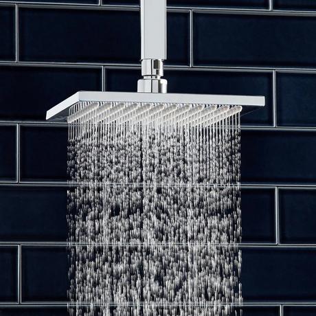 https://images.signaturehardware.com/i/signaturehdwr/SH-406631-devereaux-ceiling-mount-shower-head-with-square-arm-chrome-water.jpg?w=460&fmt=auto