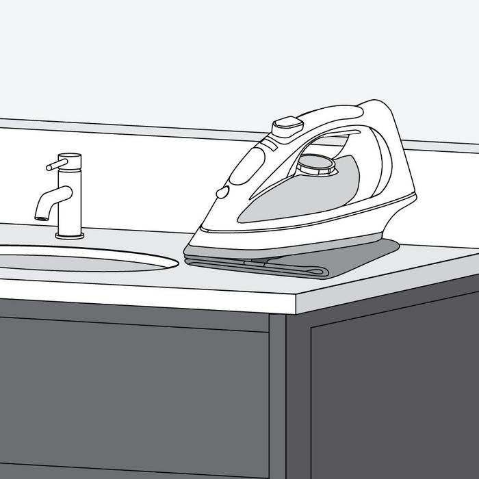 Countertop Maintenance Option 2 Step 2 - place the iron on full steam on the towel or cloth