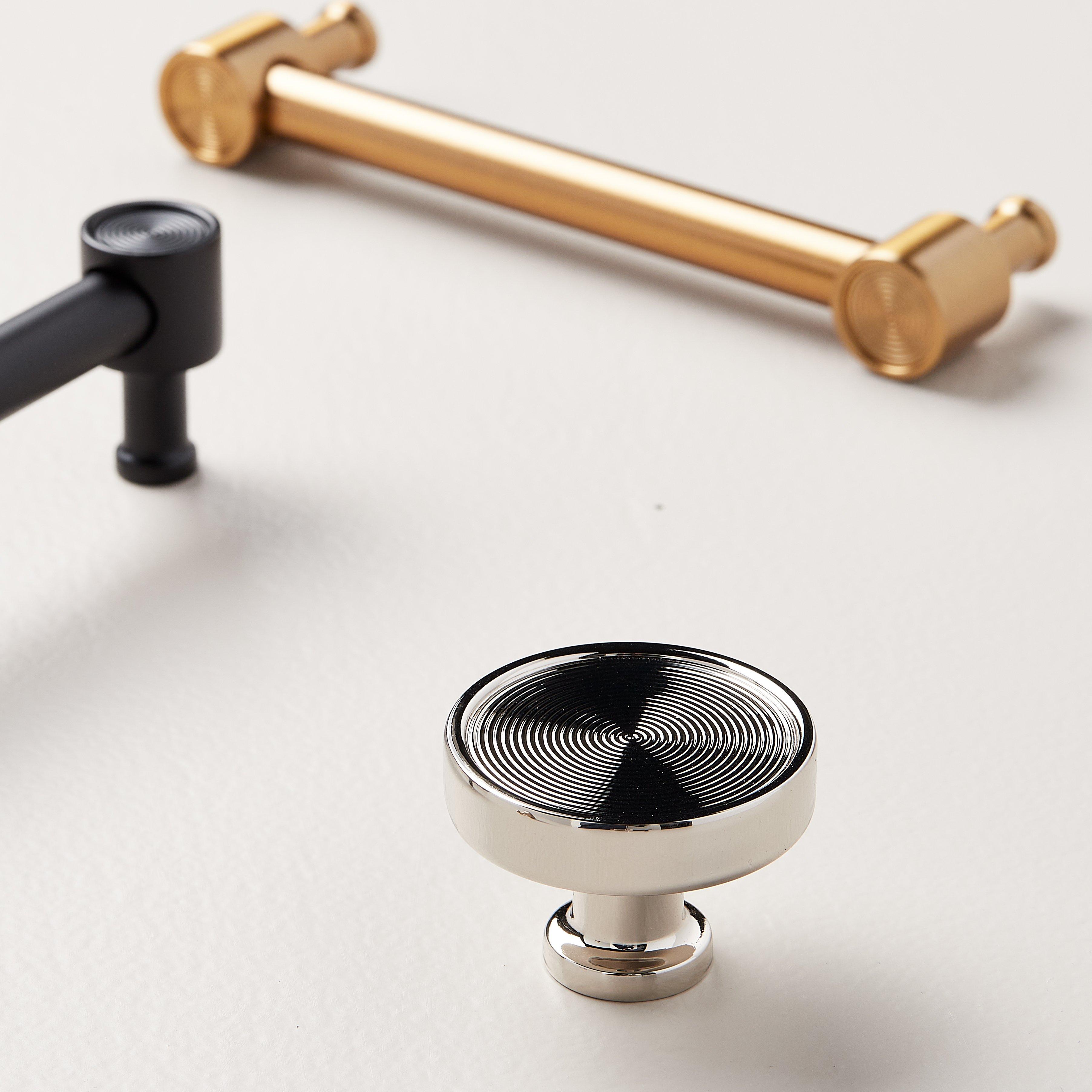 Orwell Radial Textured Round Cabinet Knob in Polished Nickel, Orwell Cabinet Pull in Brushed Gold and Matte Black