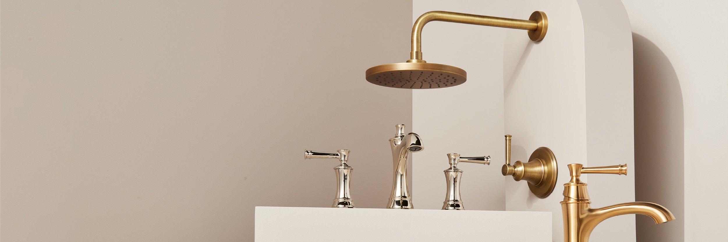 Beasley Single Hole Faucet in Brushed Gold, Beasley Widespread Bathroom Faucet in Polished Chrome, Beasley Pressure Balance Shower Head in Aged Brass
