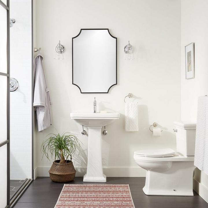 ADA compliant bathroom with Key West Two-Piece Elongated ADA Compliant Toilet, Beasley Single-Hole Bathroom Faucet in Chrome