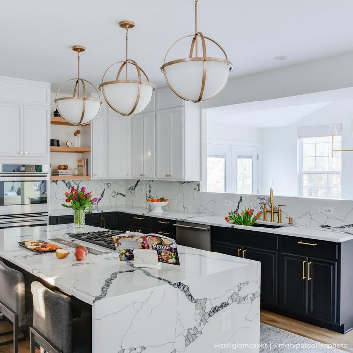 Art deco style kitchen with the Hurston Pull-Down Bridge Kitchen Faucet in Brushed Gold, Strasbourg Cabinet Pull in Satin Brass