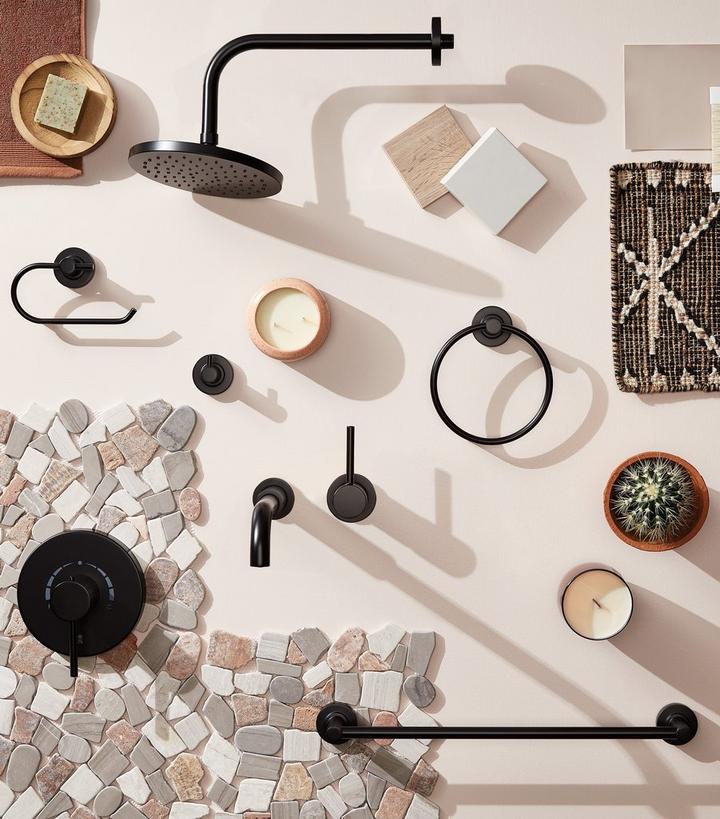 bright bathroom with white vanity and tub