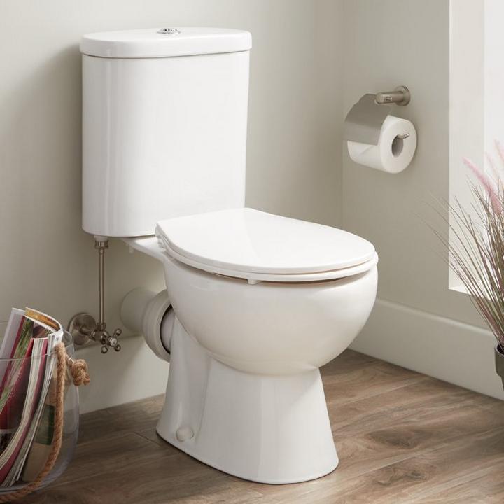 bathroom with rear outlet toilet