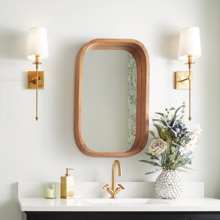 Acrewood Oval Wood Vanity Mirror in Natural Mango Wood, Calera Wall Sconce Candelabra, Vassor Single-Hole Faucet in Brushed Gold