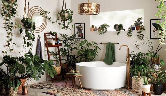 Bohemian style bathroom with 55" Dempsey Round Acrylic Freestanding Tub, Lentz Freestanding Tub Faucet in Brushed Gold