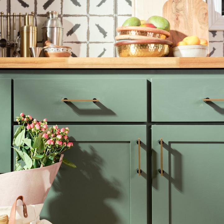 Bohemian style kitchen with the Masella Solid Brass Cabinet Pull in Black Nickel and Satin Brass