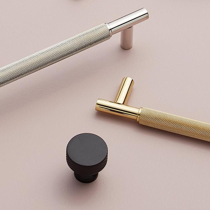 Arles Knurled Brass Cabinet Pull in Polished Nickel and Brass, and Arles Knurled Brass Cabinet Knob in Black