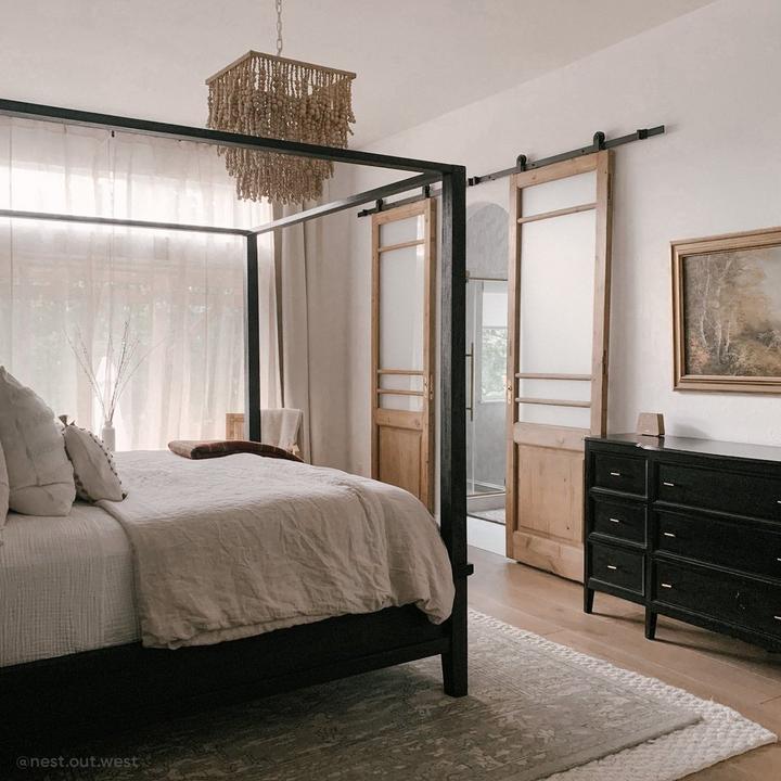 Bedroom of Cait Pappas featuring the 78" Bowden Top-Mount Barn Door Hardware Kit