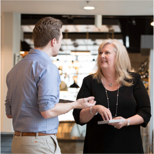 sales associate talking with a customer