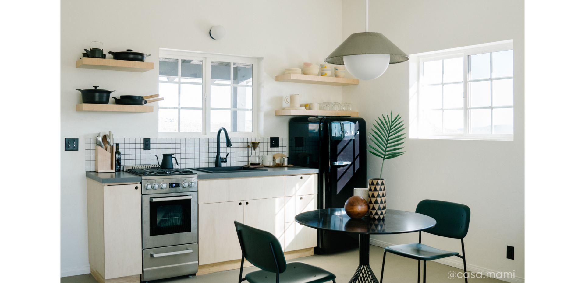 Kitchen by Airbnb designer Carlos Naude & Whitney Brown with 24" Holcomb Drop-In Sink, Wing Nut Basket Strainer in Flat Black