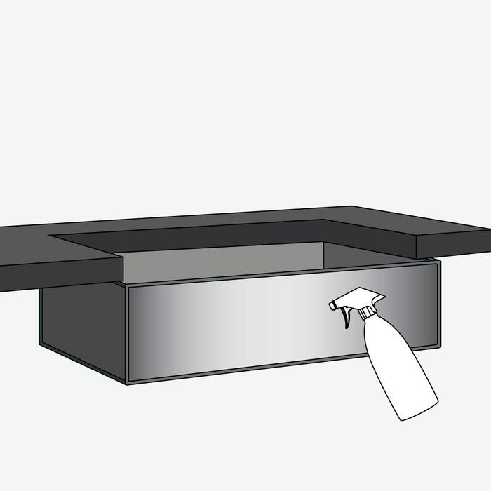 Clean Stainless Steel Method 2: Step 1 - Spray the stainless steel surface with vinegar