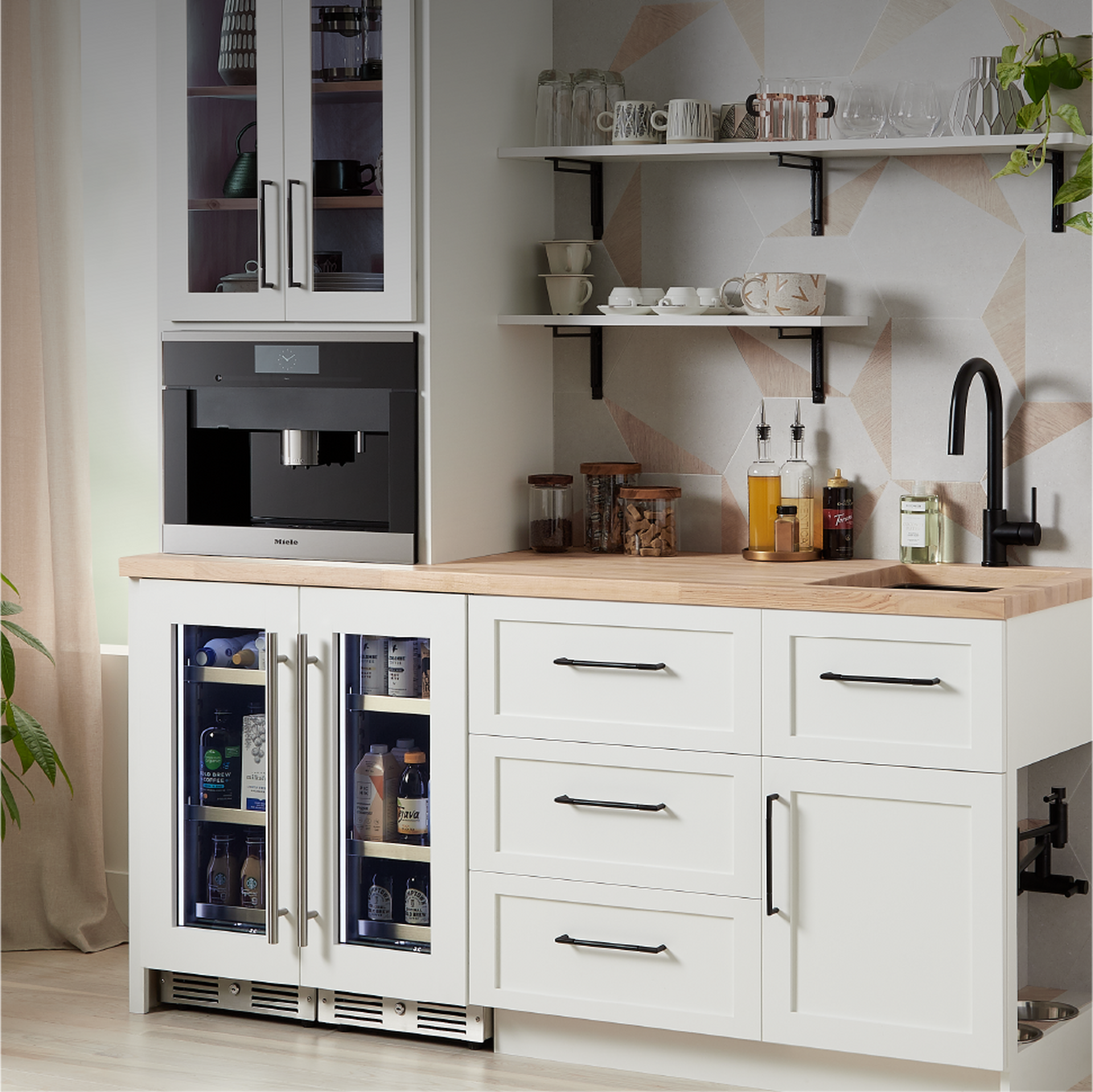 Coffee bar station cabinet with the Ravenel Bar Faucet - Matte Black, Harridge Shelf Bracket - Black Powder Coat, Lunata Brass Cabinet Pull