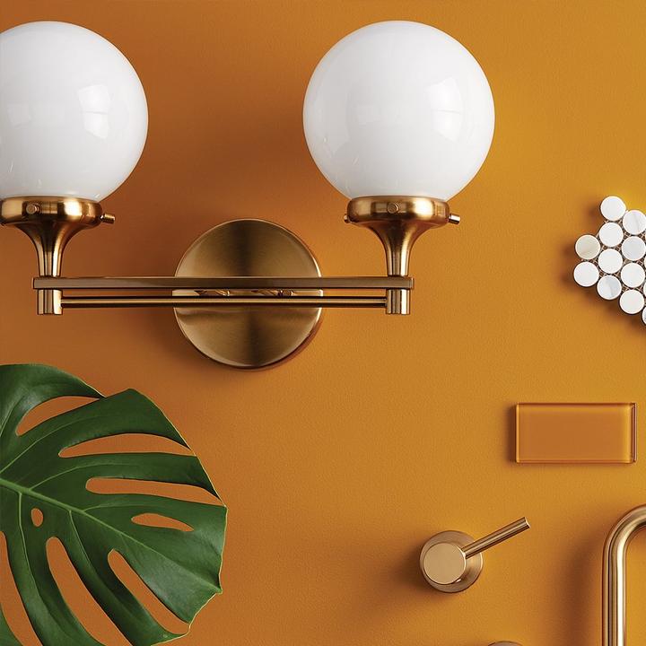 gold vanity light with other bathroom hardware