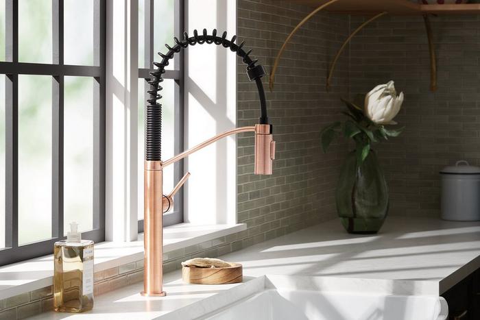Kitchen with the Eiler Single-Hole Kitchen Faucet with Pull-Down Spring Spout in Satin Copper for copper kitchen accessories