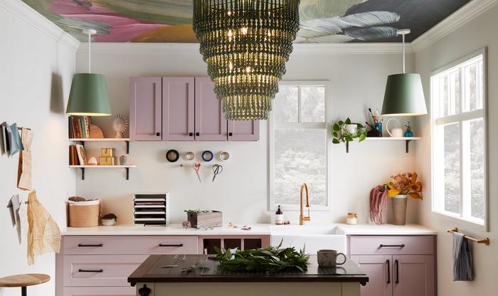 Craft room with the Ridgeway Kitchen Faucet in Brushed Gold, Wyndell 6-Light Pendant in Green, Orvin Cabinet Knob in Satin Brass