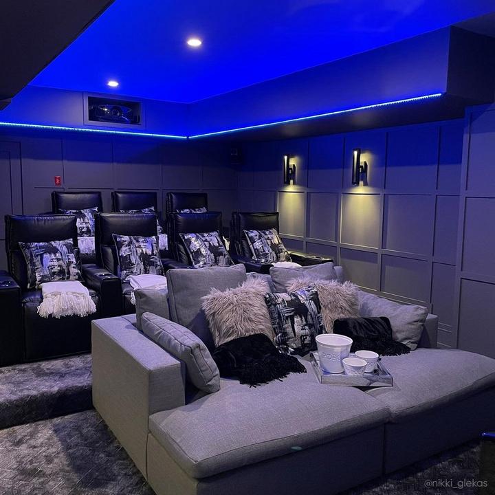 Black Paddock LED 2-Light Outdoor Entrance Wall Sconces add creative lighting in a home theater