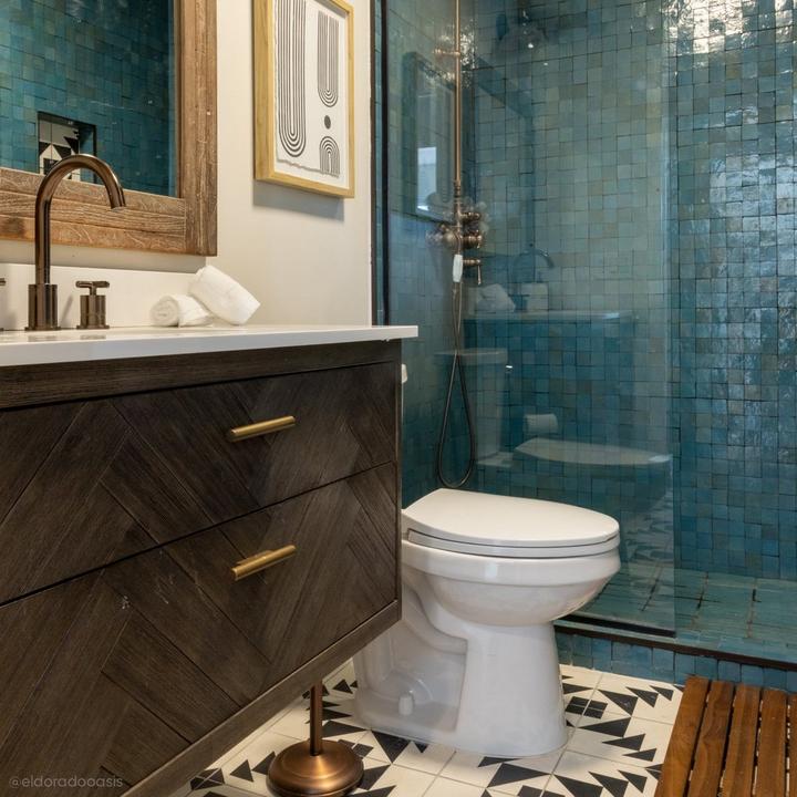 Bathroom of El Dorado Oasis with the 36" Frey Wall-Mount Vanity in Gray Wash, Bradenton Elongated Two-Piece Toilet