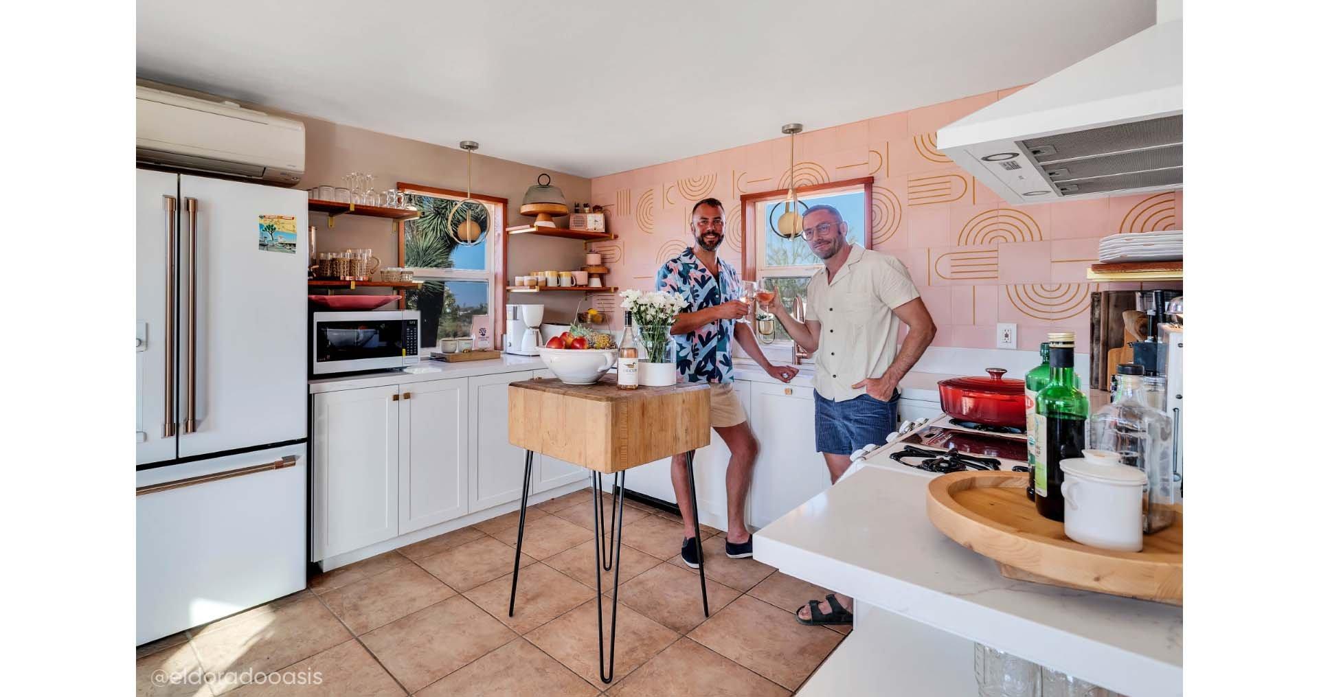Kit Williamson and John Halbach of El Dorado Oasis standing in their kitchen featuring the Solid Bronze Textured Square Knob