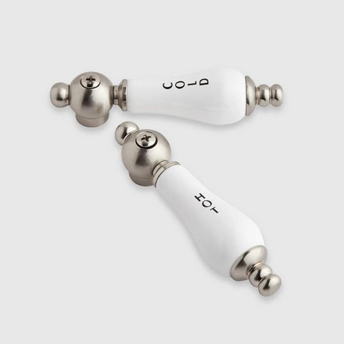 white and chrome faucet handles