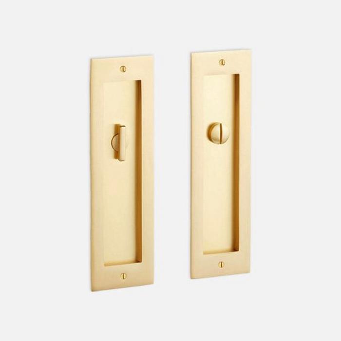 Elongated Pop-Out Brass Pocket Door Pull in Satin Brass