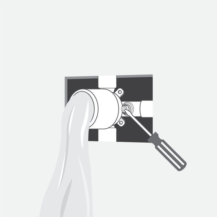 Illustration showing flushing the open valve with cold water to clean the shower valve