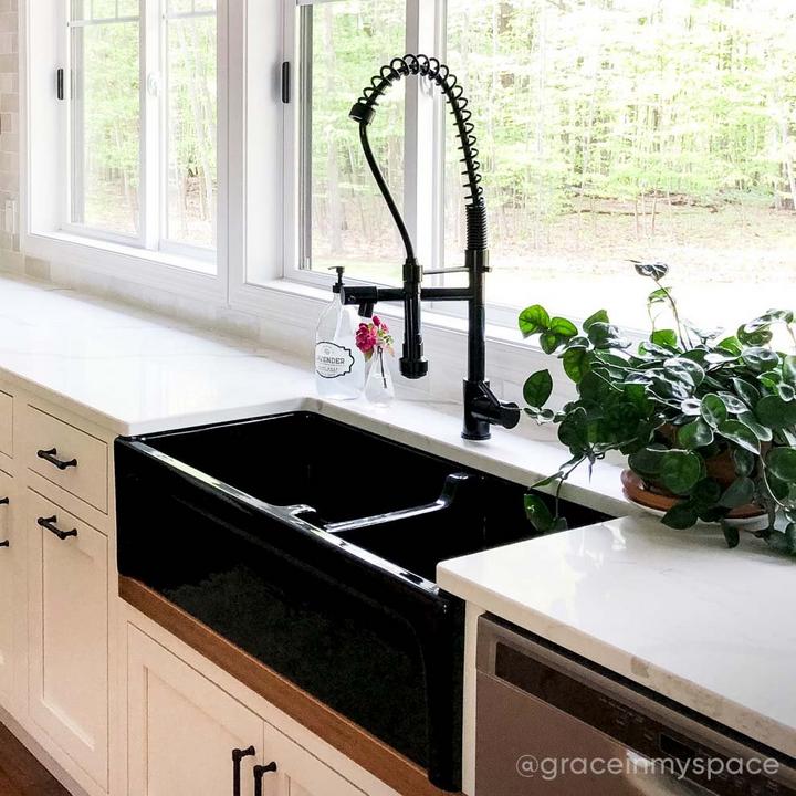 Industrial style kitchen with the Levi Kitchen Faucet with Pull-Down Spring Spout in Black