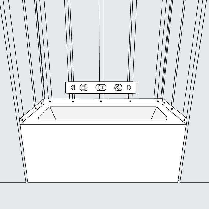 Step 5 - Before the mortar sets, position the tub within the recess until the rim is leveled against the stringers