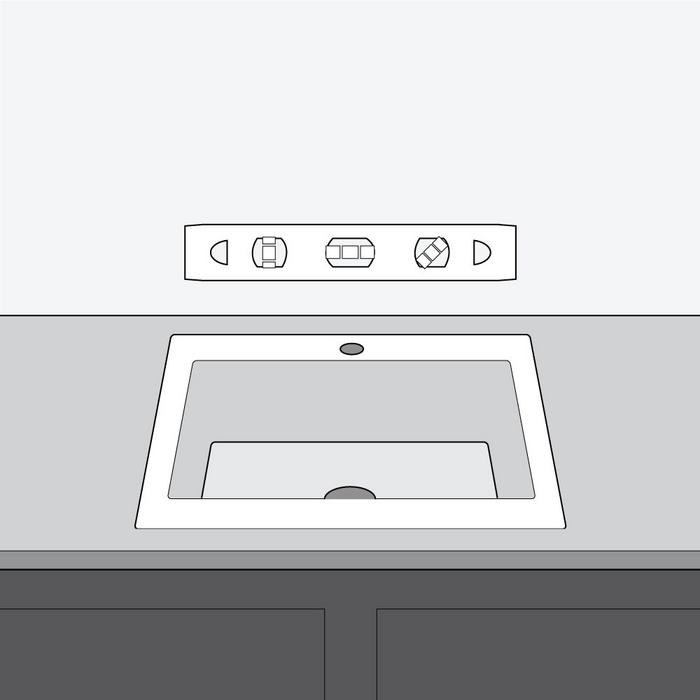 Step 3 - lower the sink back intro the cutout and press firmly into the sealant. Make sure the sink is level and aligned