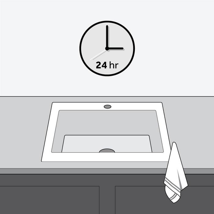 Step 5 - Wipe excess sealant around the rim of the sink with a damp clove. Allow silicone to dry at least 24 hours