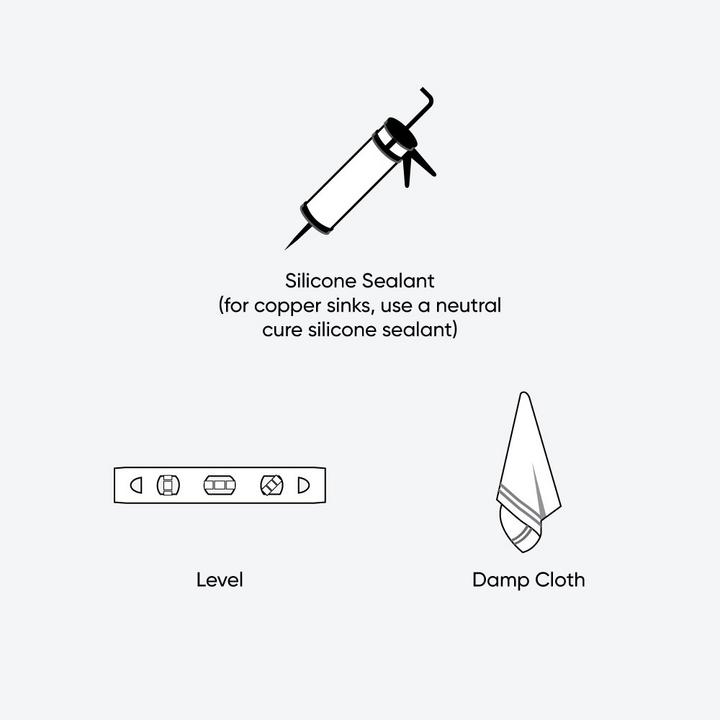How to install a drop in sink tools - damp cloth, silicone sealant, level