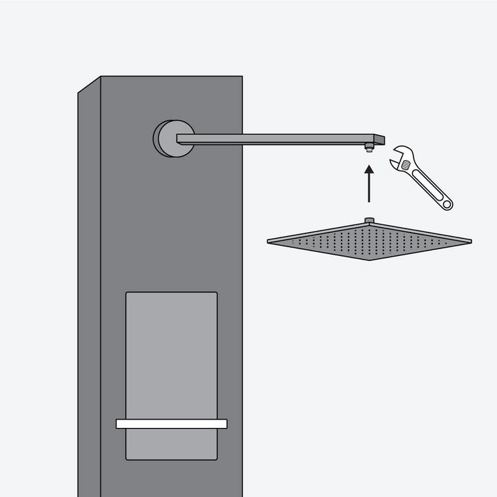 shower panel installation step 5 - insert shower arm into the panel and tighten with a wrench