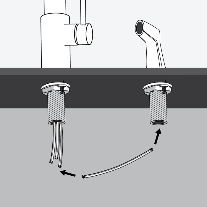 Step 6 - insert the side spray hose through the sprayer housing and attach to the spray hose outlet on the faucet