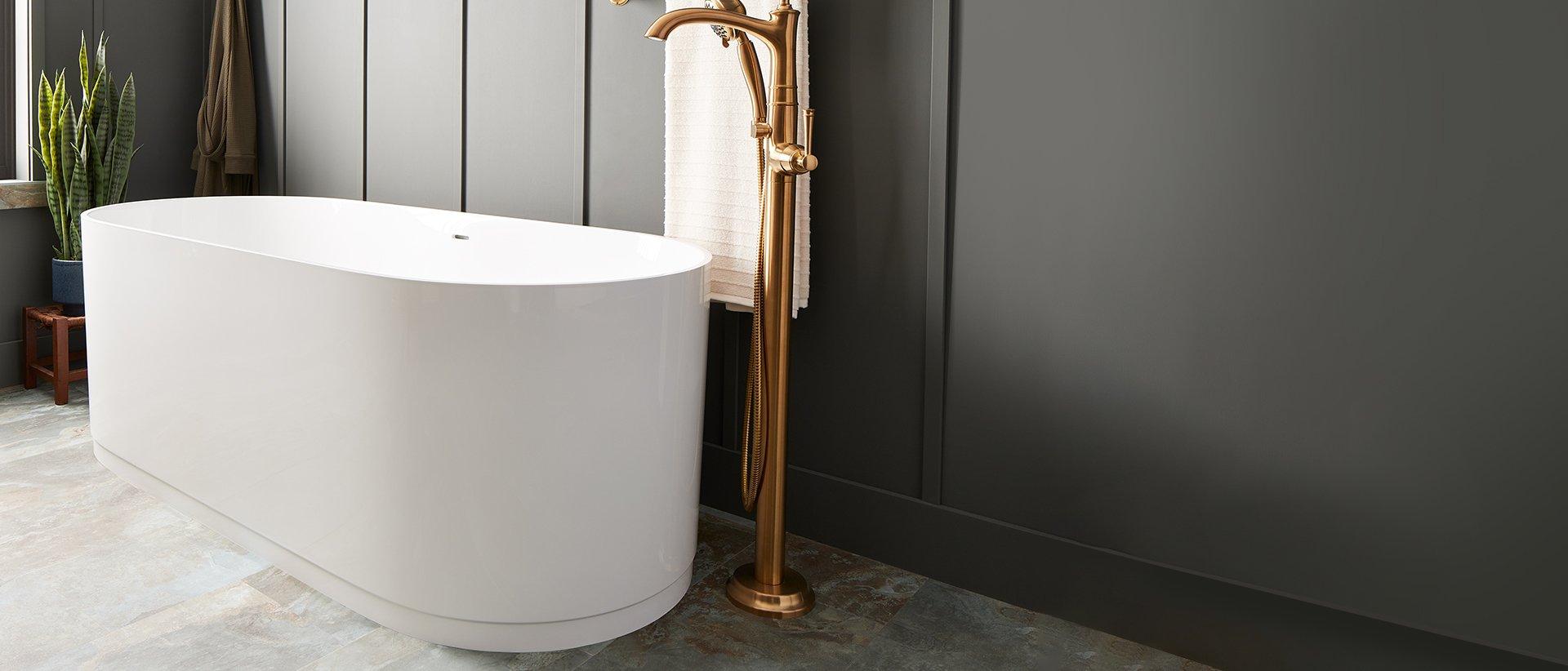 66" Lolani Solid Surface Freestanding Tub, Beasley Freestanding Tub Faucet in Brushed Gold